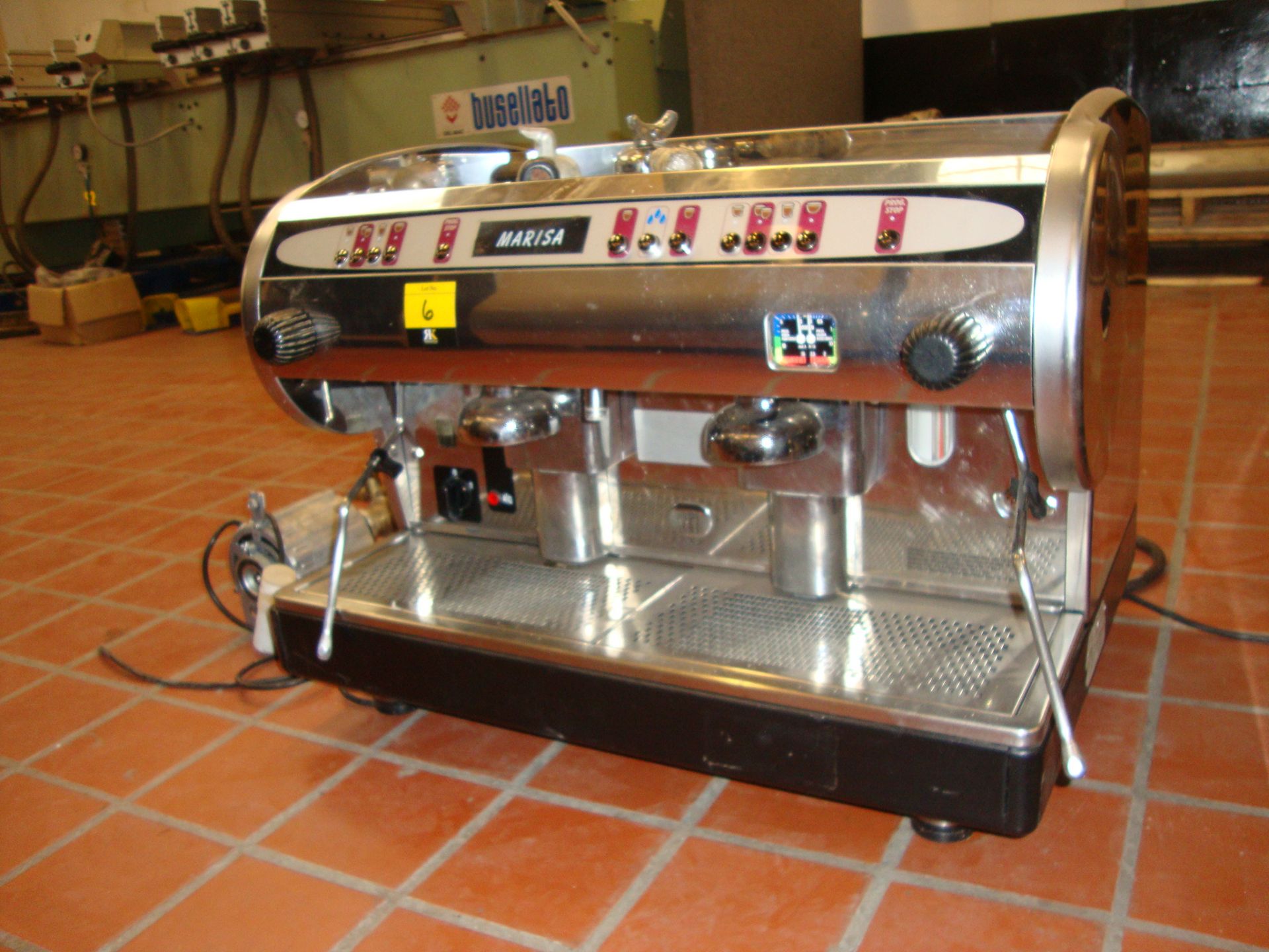 Marisa stainless steel twin head commercial coffee machine including pump pictured to side of