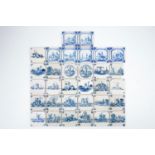 A set of 32 antique Dutch Delft blue and white tiles, 18/19th C. - Each tile ca. 13 x 13 cm. -