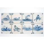 A set of 8 unusual blue and white Dutch Delft tiles, 18th C. - Each tile is ca. 13 x 13 cm. -