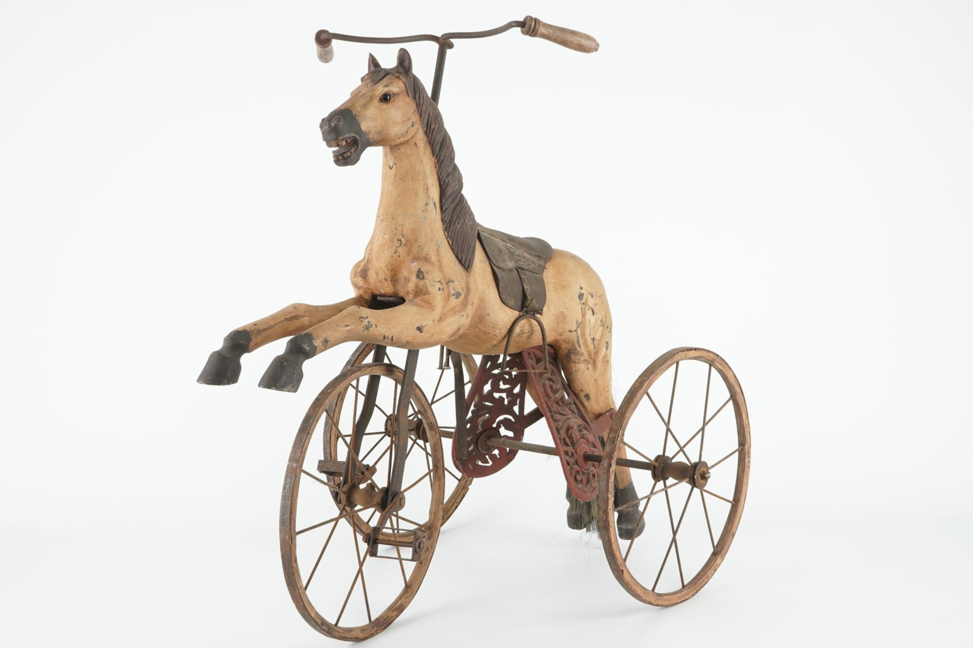 A children's tricycle with a horse, 19th C. H.: 88 cm Condition reports and high resolution pictures