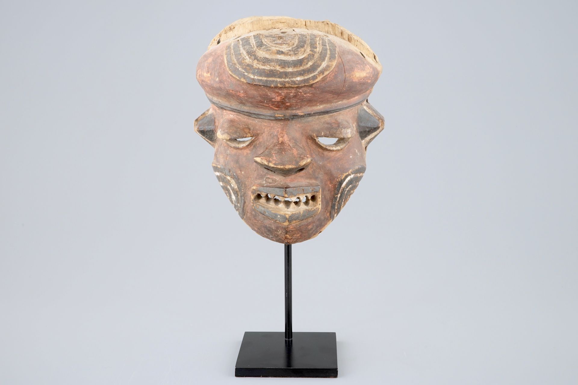 An African carved wooden "Mbuya" mask, Western Pende, Congo H.: 35 cm Condition reports and high