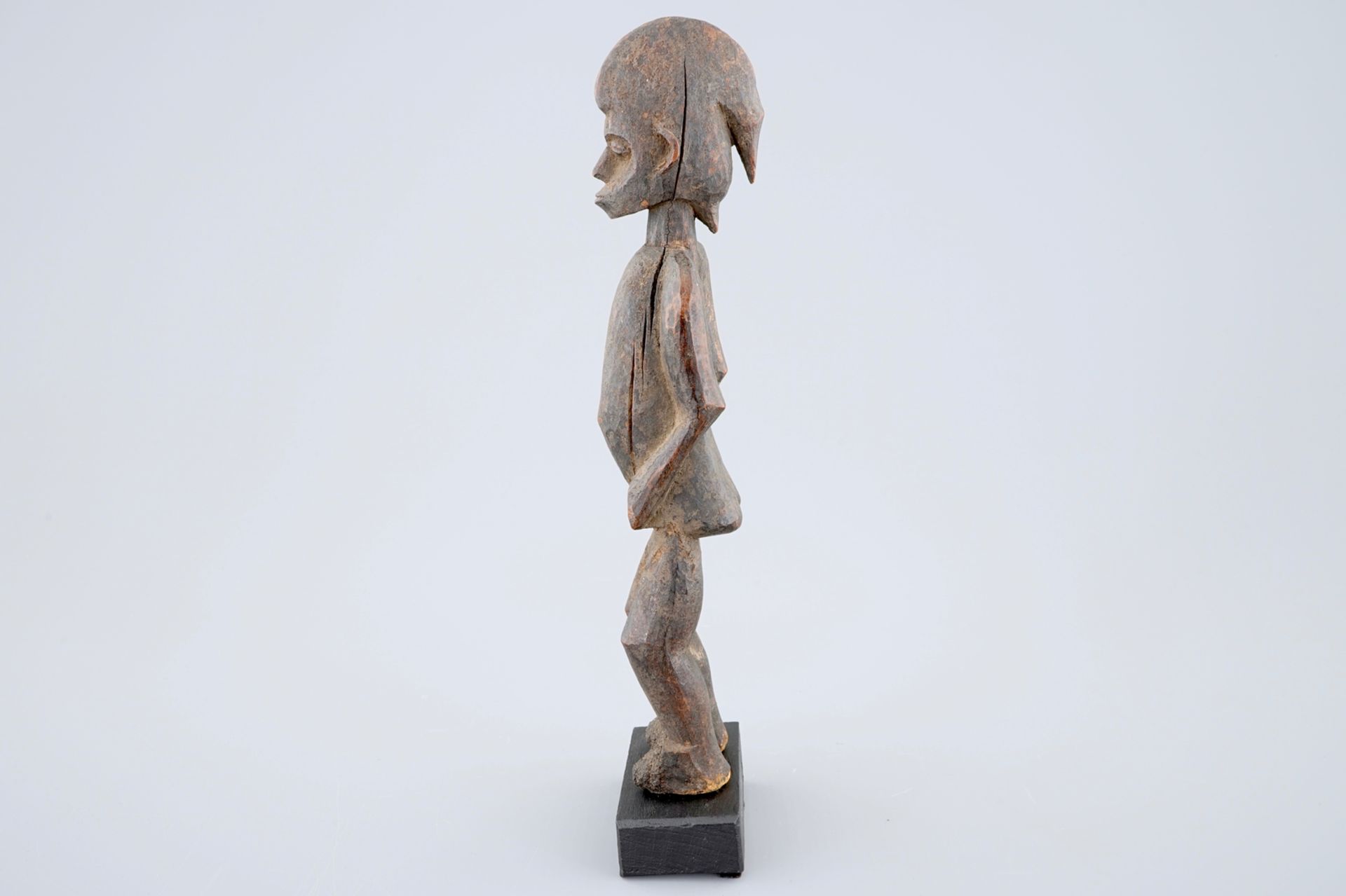 An African carved wood figure, Senufo, Ivory Coast H.: 27,5 cm Condition reports and high resolution - Image 5 of 6