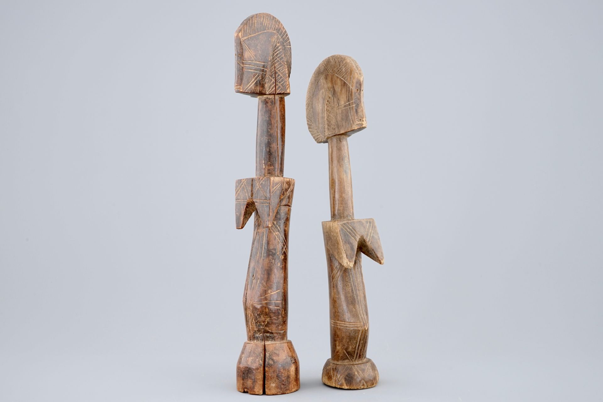 Two African carved wood figures of fertility dolls, Mossi, Congo, mid 20th C. H.: 35 cm Condition