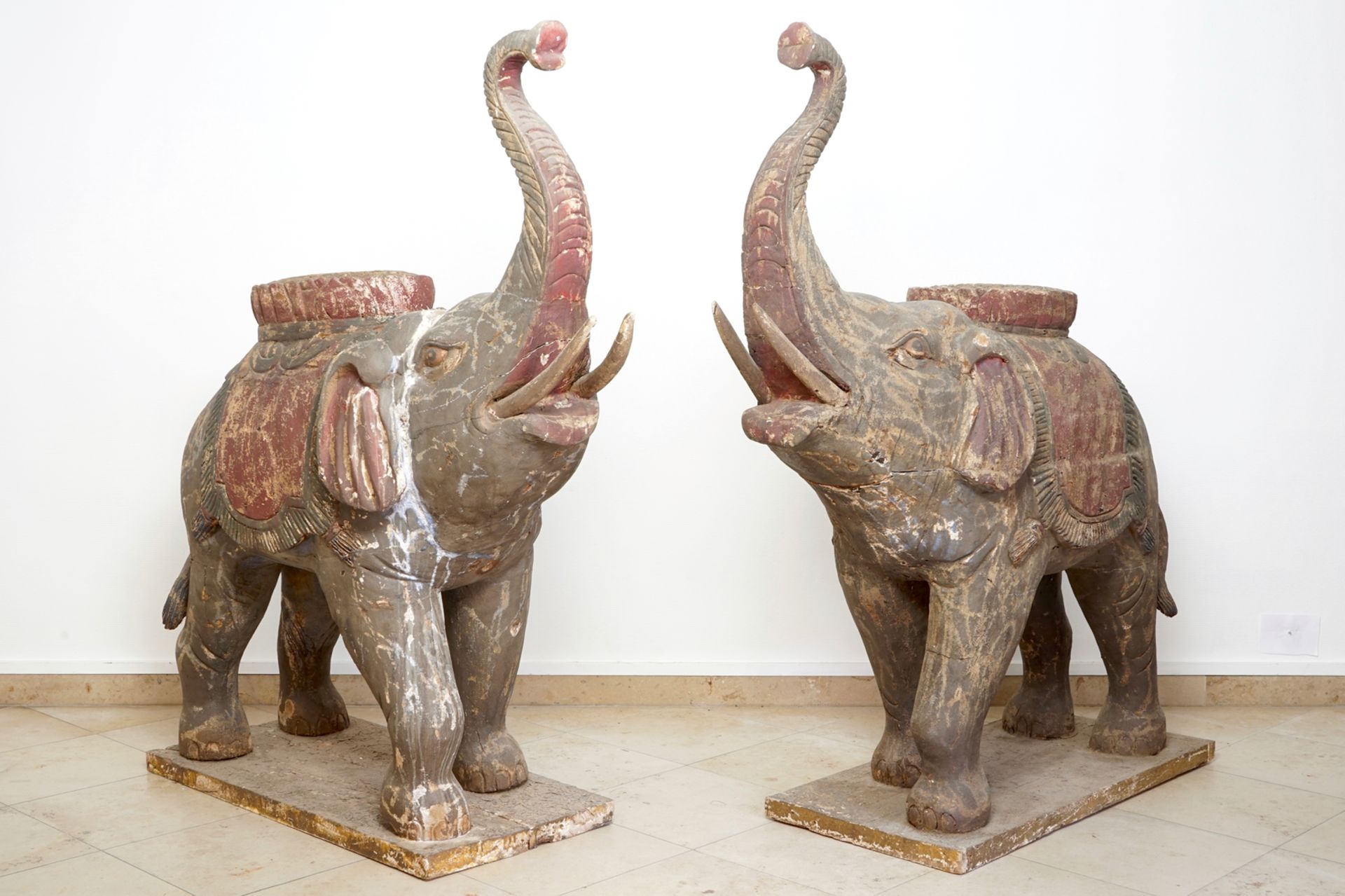 A pair of large wooden polychrome elephants, South-East Asia, 20th C. H.: 156 cm - L.: 141 cm