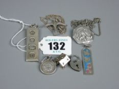 A quantity of silver jewellery including a padlock clasp, a mounted silver three pence, a log