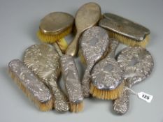 A six piece silver dressing table set of two hand mirrors, two narrow brushes and two wide