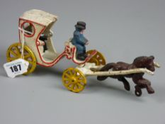 A vintage cast iron model of a horse drawn hackney carriage, brightly painted, probably European, 24