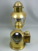 An early 20th Century ship's gimbal compass in a brass pinnacle housing with side spirit burner