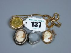 A carved cameo brooch set in a nine carat mount with safety chain, a pinchbeck mounted cameo