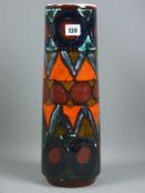 A Poole pottery vase, mid Century tall cylindrical shaped with stylized multi-coloured pattern,