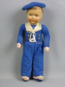 A German 'Sailor Boy' doll, cloth bodied with papier mache head and painted detail, part