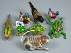 A collection of small clockwork animals to include two US Zone German ducks, two Western Germany