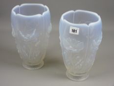 A pair of 20th Century Eastern European opalescent vases with relief moulded panels of poppies, 24