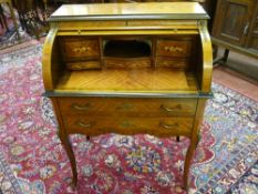 A reproduction inlaid Kingwood style and brass embellished cylinder bureau with multi-wood decorated