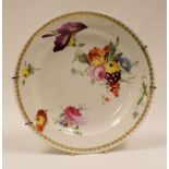 SWANSEA PORCELAIN - circular plate with sprays of interior flowers and with continuous gilt swirls