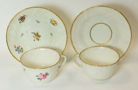 SWANSEA PORCELAIN - two cups and saucers, both moulded with basket-weave and swirls, one with simple