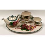 LLANELLY POTTERY - five piece cabaret-size tea-service, comprising oval tray, teapot, cream jug, cup