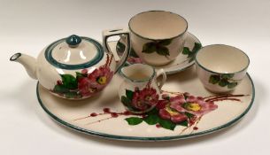 LLANELLY POTTERY - five piece cabaret-size tea-service, comprising oval tray, teapot, cream jug, cup