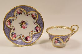 NANTGARW PORCELAIN - finely painted tea-cup and saucer, having gilded border with purple motif