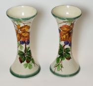 LLANELLY POTTERY - pair of waisted spill-vases painted in the rarely seen 'Blackberry' decoration,