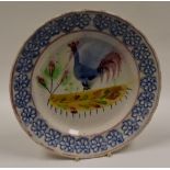 LLANELLY POTTERY - cockerel plate with sponged floral border, 25cms diam