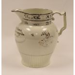 ATTRIBUTED TO SWANSEA POTTERY - silver gilt decorated jug with flowers to the body and inscription