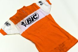 CYCLING JERSEY WORN BY JACQUES ANQUETIL (1934-1987) OF FRANCE Condition: orange and white jersey and