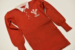 1912 WELSH INTERNATIONAL RUGBY JERSEY MATCH-WORN BY B R LEWIS Condition: woollen jersey complete