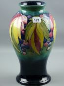 A fine large green ground Moorcroft Wisteria baluster vase, 33 cms high