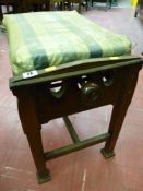 A late 19th Century rosewood rise and fall piano stool, 50 x 57 cms approximately fully wound down