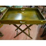 An oak butler's tray on stand, twin handled deep tray 70 x 44 cms, 8 cms deep on a folding wooden