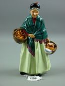 A Royal Doulton pottery figurine 'The Orange Lady' HN1953