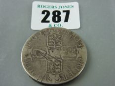 A 1708/7 silver overdated five shilling piece