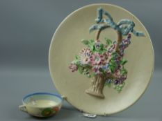 A Clarice Cliff My Garden wall charger, cream ground with a ribbon tied flower basket in relief,