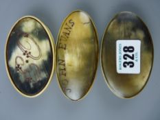 Three oval horn lidded snuff boxes, one inscribed 'John Evans', one with the stylized letters 'E'
