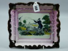 Sunderland lustre - a pink bordered sporting scene plaque of a hunter downing a bird with his two