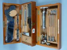 Two mahogany cased sets of surgical instruments by Down Brothers, London including a bone doctor's