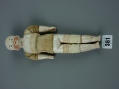 Toys - a Motschmann Sonnerburg Taufling type doll, male painted porcelain face, (chest damaged),