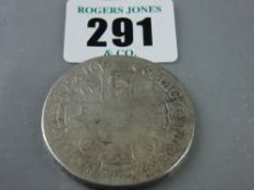 A 1666 silver five shilling piece