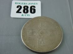 A 1696 silver five shilling piece