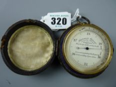 A 19th Century gilt metal pocket barometer with silvered dial and moving bezel, the dial marked '