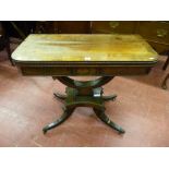 A William IV rosewood foldover card table on an open curved support, short pedestal and platform