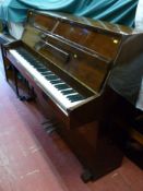 A highly polished Weber mahogany upright piano, 110 x 142 cms