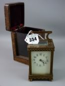 A late 19th/early 20th Century French carriage clock, stamped to the rear 'R & Co, Made in Paris', a