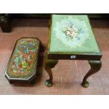 A rectangular mahogany footstool with canted corners and floral patterned beadwork top, 57 cms
