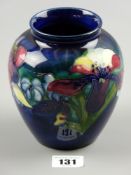 An ovoid form Moorcroft Orchid vase with slightly flared rim, painted and impressed marks to the