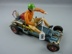 Toys - a Japanese made battery operated cart and driver, 27 cms long