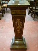 A good inlaid rosewood pedestal stand with boxwood line inlay, ribbon and floral inlaid front