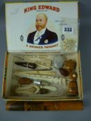 A collection of antique and vintage sewing items to include a mauchline ware needle case and thimble