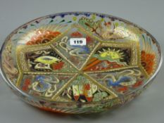 An early 20th Century Spanish glass shallow bowl having flamboyant gilt and colourful enamel